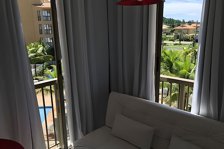 Loft aconchegante com sol da manhã e vista exclusiva. Seu re